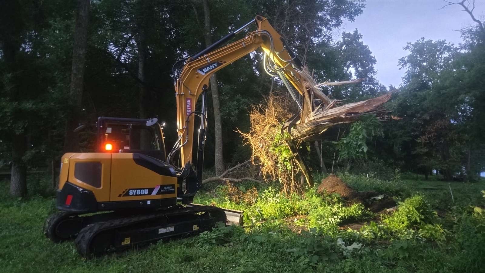 Compact excavator land clearing and tree removal near Fergus Falls, MN Compact excavator land clearing and tree removal near Fergus Falls, MN